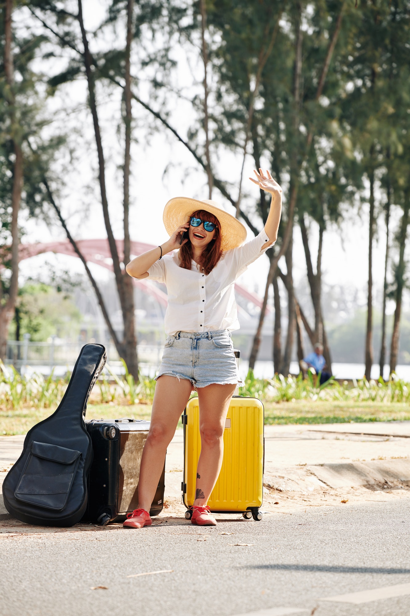 female-traveler-trying-to-chatch-car.jpg